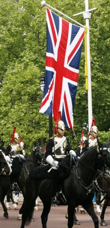 London, UK - June 15, 2013: Household Cavalry at Queen's Birthday Parade, Union Jack in the background. Queen's Birthday Parade take place to Celebrate Queen's Official Birthday in every June in London. 
のeditorial素材
