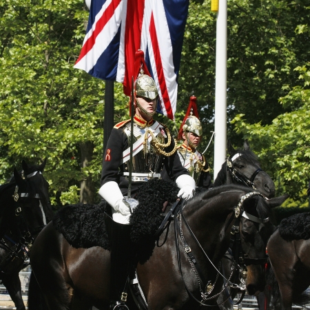 London, UK - June 15, 2013: Household Cavalry at Queen's Birthday Parade, Union Jack in the background. Queen's Birthday Parade take place to Celebrate Queen's Official Birthday in every June in London. 
のeditorial素材