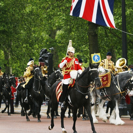 London, UK - June 15, 2013: Queen's Bands, mounted band, union jack flag in the back ground, at Queen's Birthday Parade. Queen's Birthday Parade take place to Celebrate Queen's Official Birthday in every June in London. 
のeditorial素材