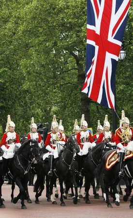 London, UK - June 15, 2013: Household Cavalry at Queen's Birthday Parade, Union Jack in the background. Queen's Birthday Parade take place to Celebrate Queen's Official Birthday in every June in London. 
のeditorial素材