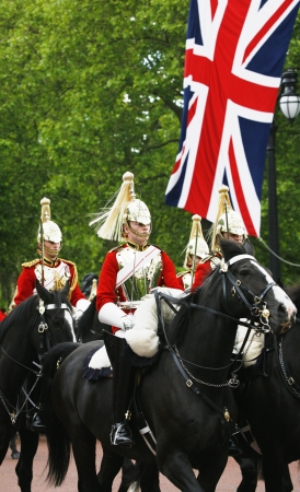 London, UK - June 15, 2013: Household Cavalry at Queen's Birthday Parade, Union Jack in the background. Queen's Birthday Parade take place to Celebrate Queen's Official Birthday in every June in London. 
のeditorial素材