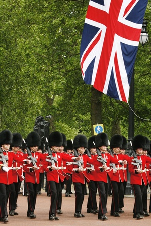 London, UK - June 15, 2013: Queen's Soldier at Queen's Birthday Parade, union jack present. Queen's Birthday Parade take place to Celebrate Queen's Official Birthday in every June in London. 
のeditorial素材