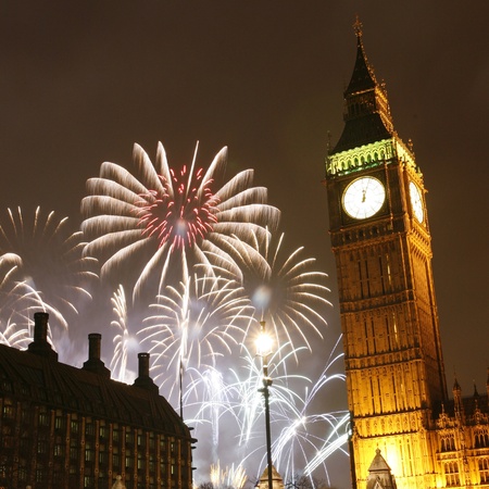 LONDON, UK - JANUARY 01, 2013: Fireworks over Big Ben at midnight, in Westminster, one of London's main tourist attractions, be seen from the Parliament Square. のeditorial素材
