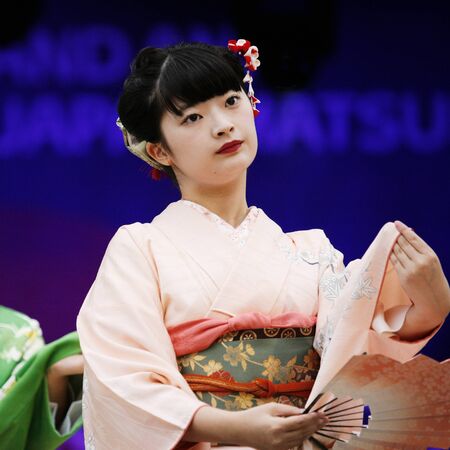 London, UK - October 5, 2013: Participants, Hiroko Tanaka Nihon Buyo Team-Japanese dance, influenced by Kabuki dance, at 2013 London Japanese Matsuri (festival), various of activities to keep all ages happy at the Japan Matsuri Festival at Trafalgar Squarのeditorial素材