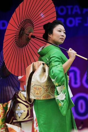 London, UK - October 5, 2013: Participants, Hiroko Tanaka Nihon Buyo Team-Japanese dance, influenced by Kabuki dance, at 2013 London Japanese Matsuri (festival), various of activities to keep all ages happy at the Japan Matsuri Festival at Trafalgar Squarのeditorial素材