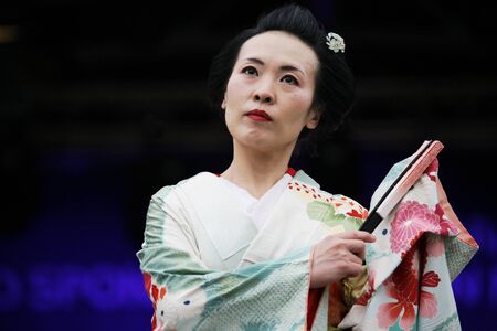 London, UK - October 5, 2013: Participants, Hiroko Tanaka Nihon Buyo Team-Japanese dance, influenced by Kabuki dance, at 2013 London Japanese Matsuri (festival), various of activities to keep all ages happy at the Japan Matsuri Festival at Trafalgar Squarのeditorial素材