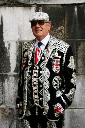 London, UK - September 29, 2013: Participants at 2013 Pearly Kings and Queens, wearing clothes...