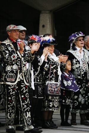 London, UK - September 29, 2013: Participants at 2013 Pearly Kings and Queens, wearing clothes decorated with commonly called pearl, charitable tradition of working class culture, Harvest Festival. 
のeditorial素材