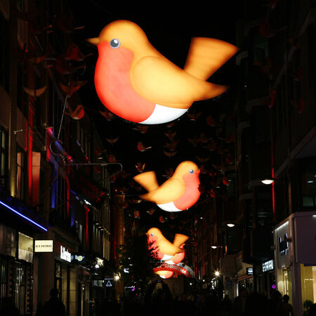 London, UK - November 21, 2013: Christmas Lights Display on Carnaby Street in London, people present. The modern colourful Christmas lights attract and encourage people to the street. 
のeditorial素材
