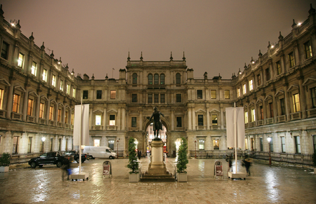 London, UK - Dec 21, 2010 : Night view of The Royal Academy of Arts, privately funded institution led by eminent artists, established 1768, in Piccadilly, London. 

のeditorial素材
