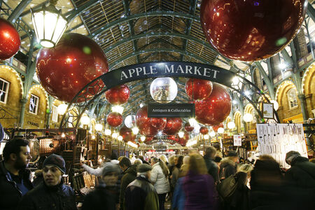 London, UK - December 9, 2013: Christmas Lights Display in Covent Garden Market, people prsent, in London. The modern colourful Christmas lights attract and encourage people to the market. 
のeditorial素材