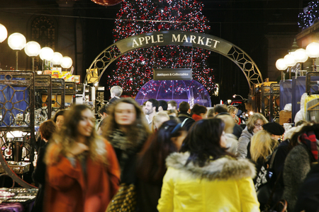 London, UK - December 9, 2013: Christmas Lights Display in Covent Garden Market, people prsent, in London. The modern colourful Christmas lights attract and encourage people to the market. 
のeditorial素材