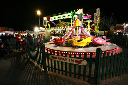 London, UK - November 26, 2013: Night scene of Hyde Park's winter wonder land, People can enjoy the rides and attractions in the famous Winter wonderland, take place yearly, at Hyde park, Londonのeditorial素材