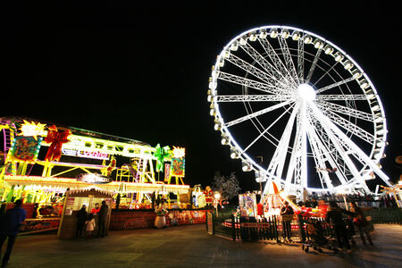 London, UK - November 26, 2013: Night scene of Hyde Park's winter wonder land, People can enjoy the rides and attractions in the famous Winter wonderland, take place yearly, at Hyde park, Londonのeditorial素材