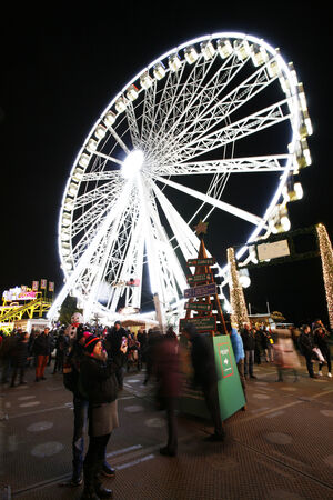 London, UK - November 26, 2013: Night scene of Hyde Park's winter wonder land, People can enjoy the rides and attractions in the famous Winter wonderland, take place yearly, at Hyde park, Londonのeditorial素材