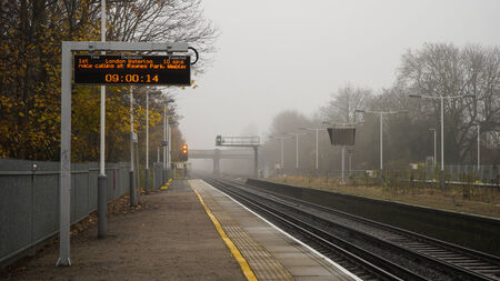 Suburban railway train station in a quiet morning, UKのeditorial素材