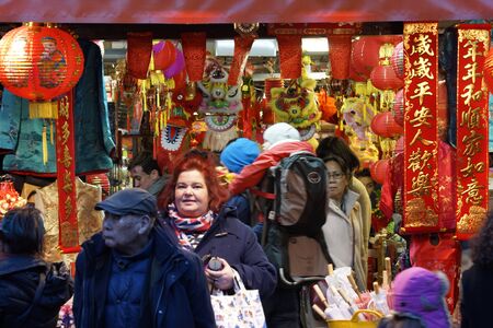 London, UK - Feb 21, 2015:  Unidentified Visitors during the Chinese New Year, London China Town, Chinese New Year Eve, people present, established in 1880 th of Chinese sailors and traders, located in Soho area. a major touristic attraction.のeditorial素材