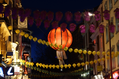 London, UK - Feb 21, 2015:  Night view of London ChinaTown, Chinese New Year Eve, established in 1880 th of Chinese sailors and traders, located in Soho area. a major touristic attraction.のeditorial素材