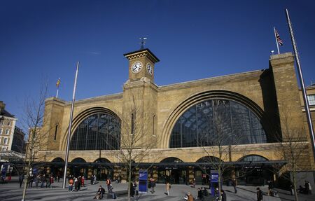 London, UK - Feb 16, 2015:  outside view of King's Cross train station, people present, opened 1852, also called London St Pancras International railway station, home of the Eurostar.のeditorial素材