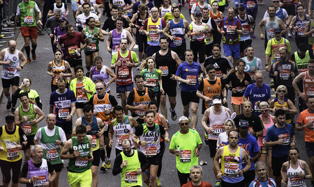 London, UK - April 26, 2015: Runners in London Marathon. The London Marathon is next to New York, Berlin, Chicago and Boston to the World Marathon Majors, the Champions League in the marathon.のeditorial素材