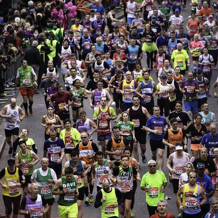 London, UK - April 26, 2015: Runners in London Marathon. The London Marathon is next to New York, Berlin, Chicago and Boston to the World Marathon Majors, the Champions League in the marathon.のeditorial素材