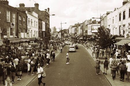 London, UK - August 22, 2015: Street view of Camden Market, people present, famous tourist attractions in Camden Town, also called Camden Lock. The Market attracting about 100,000 visitors each weekend.のeditorial素材