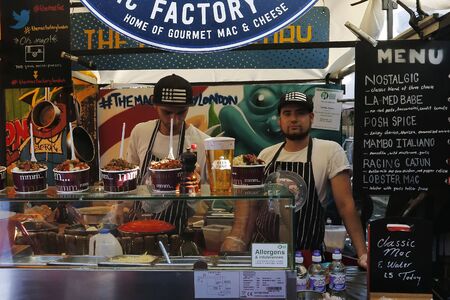 London, UK - August 22, 2015: Street Foods in Camden Market, people present, famous tourist attractions in Camden Town, also called Camden Lock. The Market attracting about 100,000 visitors each weekend.のeditorial素材