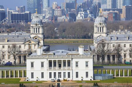 London Skyline seen from Greenwich Park. Overlooking Canary Wharf with Maritime Museum.のeditorial素材