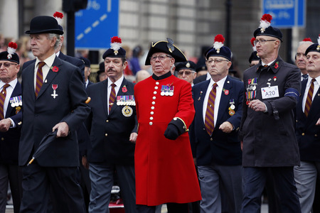 London, UK - November 8, 2015: People take part in Remembrance Day, Poppy Day or Armistice Day, nearst Sunday of 11 every Nov, observed by Commonwealth of Nations, to remember armed forces who have died since First World War.のeditorial素材