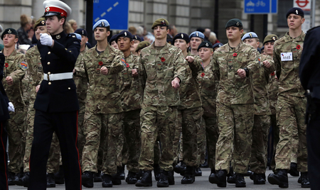 London, UK - November 8, 2015: People take part in Remembrance Day, Poppy Day or Armistice Day, nearst Sunday of 11 every Nov, observed by Commonwealth of Nations, to remember armed forces who have died since First World War.のeditorial素材