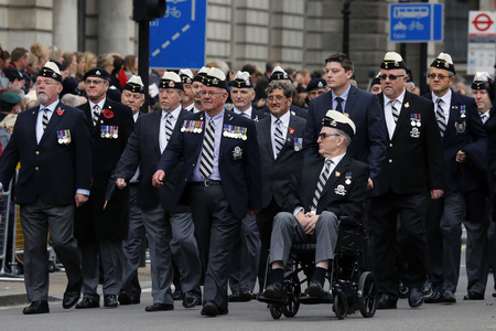 London, UK - November 8, 2015: People take part in Remembrance Day, Poppy Day or Armistice Day, nearst Sunday of 11 every Nov, observed by Commonwealth of Nations, to remember armed forces who have died since First World War.のeditorial素材