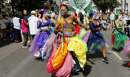 London , UK - Aug 29, 2016: Performers take part in the second day of Notting Hill Carnival, largest in Europe. Carnival takes place over two days in every August.のeditorial素材