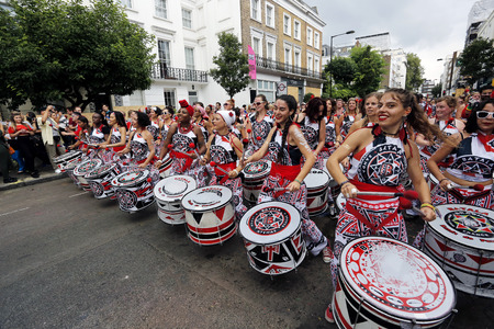 London , UK - Aug 29, 2016: Performers take part in the second day of Notting Hill Carnival, largest in Europe. Carnival takes place over two days in every August.のeditorial素材