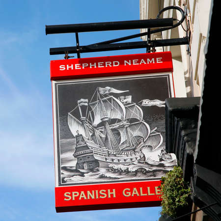 London, UK - October 06, 2012: English pub sign, Public house, known as pub, is focal point of community. Pub business, now about 53,500 pubs in UK, has been declining every year.のeditorial素材