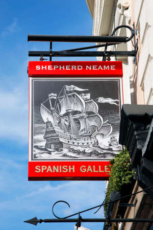 London, UK - October 06, 2012: English pub sign, Public house, known as pub, is focal point of community. Pub business, now about 53,500 pubs in UK, has been declining every year.のeditorial素材