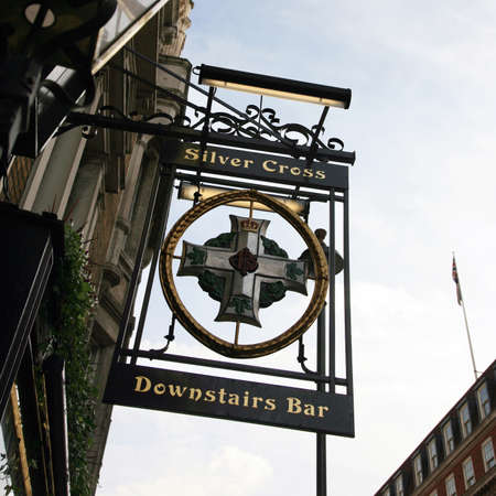 London, UK - October 18, 2010: English pub sign, Public house, known as pub, is focal point of...