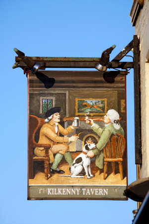 London, UK - April 20, 2013: English pub sign, Public house, known as pub, is focal point of community. Pub business, now about 53,500 pubs in UK, has been declining every year.のeditorial素材
