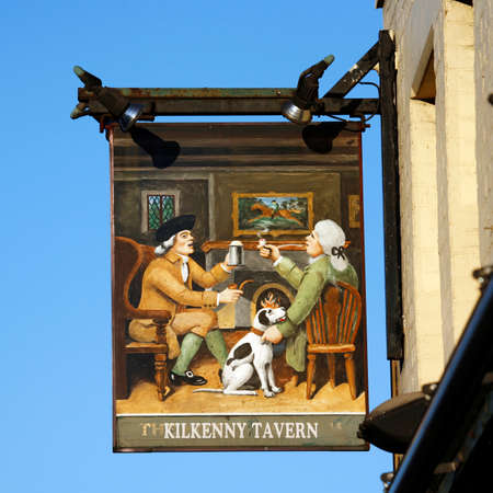 London, UK - April 20, 2013: English pub sign, Public house, known as pub, is focal point of community. Pub business, now about 53,500 pubs in UK, has been declining every year.のeditorial素材