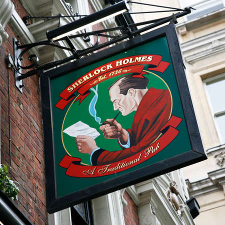 London, UK - May 06, 2012: English pub sign, Public house, known as pub, is focal point of community. Pub business, now about 53,500 pubs in UK, has been declining every year.のeditorial素材
