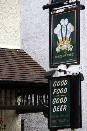 London, UK - May 12, 2010: English pub sign, Public house, known as pub, is focal point of community. Pub business, now about 53,500 pubs in UK, has been declining every year.のeditorial素材