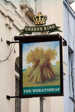 London, UK - July 21, 2010: English pub sign, Public house, known as pub, is focal point of community. Pub business, now about 53,500 pubs in UK, has been declining every year.のeditorial素材