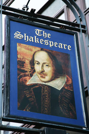 London, UK - February 14, 2011: English pub sign, Public house, known as pub, is focal point of community. Pub business, now about 53,500 pubs in UK, has been declining every year.のeditorial素材