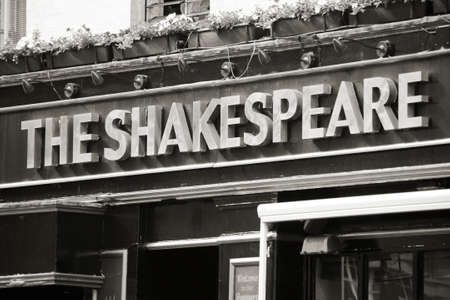 London, UK - June 13, 2012: English pub sign, Public house, known as pub, is focal point of community. Pub business, now about 53,500 pubs in UK, has been declining every year.のeditorial素材
