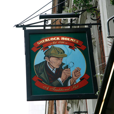 London, UK - May 06, 2012: English pub sign, Public house, known as pub, is focal point of community. Pub business, now about 53,500 pubs in UK, has been declining every year.のeditorial素材
