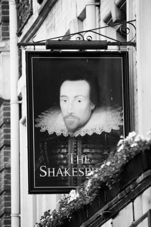 London, UK - June 13, 2012: English pub sign, Public house, known as pub, is focal point of community. Pub business, now about 53,500 pubs in UK, has been declining every year.のeditorial素材