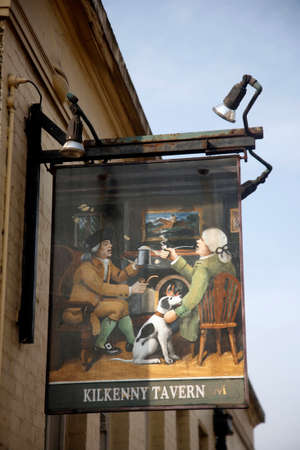 London, UK - March 22, 2012: English pub sign, Public house, known as pub, is focal point of community. Pub business, now about 53,500 pubs in UK, has been declining every year.のeditorial素材