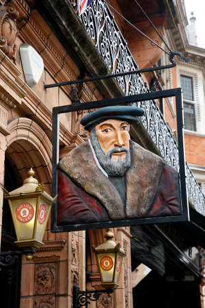 London, UK - May 05, 2012: English pub sign, Public house, known as pub, is focal point of community. Pub business, now about 53,500 pubs in UK, has been declining every year.のeditorial素材