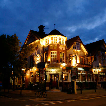 London, UK - May 16, 2012: Outside view of pub, for drinking and socializing, focal point of community. Pub business, now about 53,500 pubs in the UK, has been declining every year.のeditorial素材