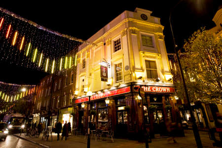 London, UK - Dec 10, 2012: Outside view of pub, for drinking and socializing, focal point of community. Pub business, now about 53,500 pubs in the UK, has been declining every year.のeditorial素材
