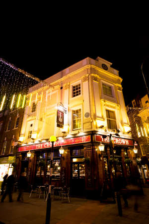London, UK - Dec 10, 2012: Outside view of pub, for drinking and socializing, focal point of community. Pub business, now about 53,500 pubs in the UK, has been declining every year.のeditorial素材